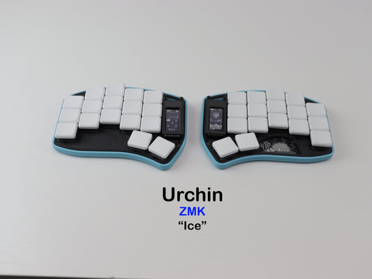 Two ZMK Urchin keyboards labeled 'Ice' on a light gray background